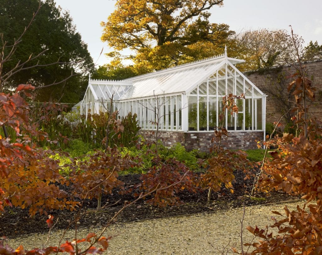 Large Victorian greenhouse in autumn
